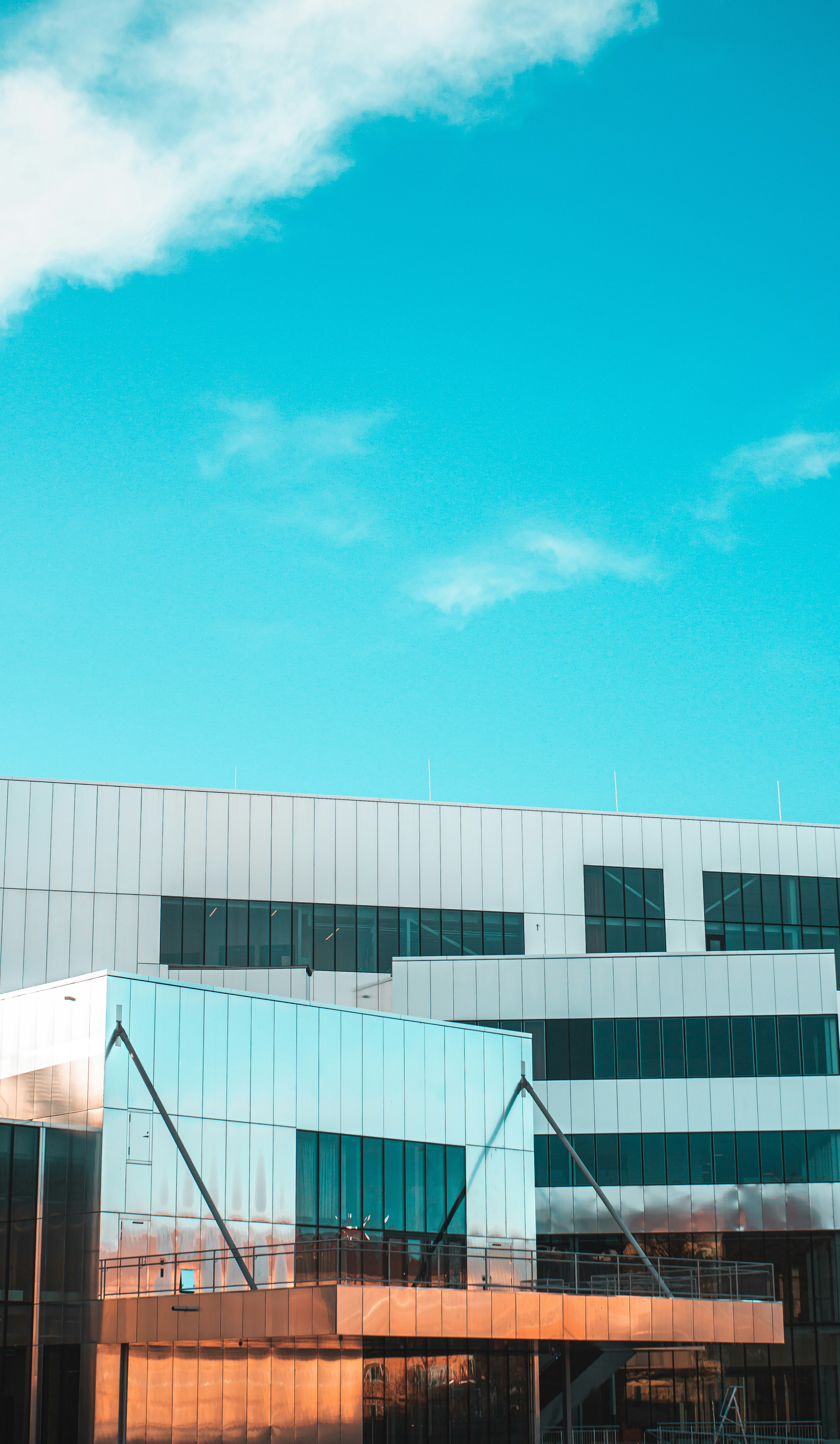 white concrete building under blue sky during daytime